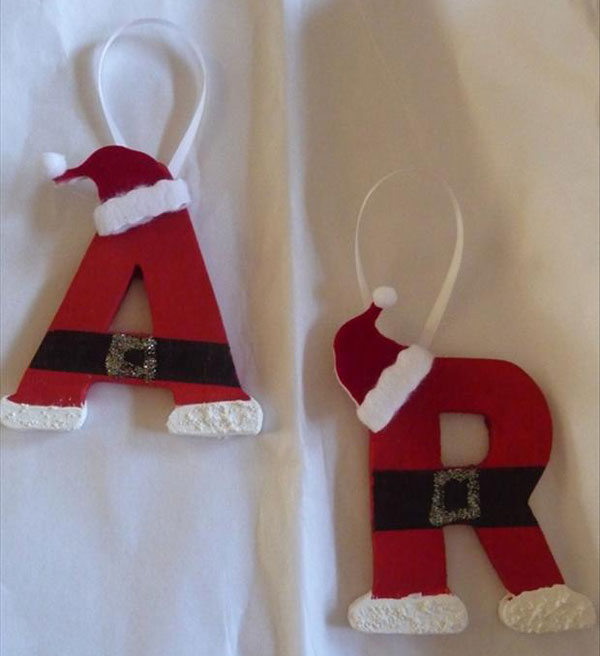 Mini wooden letters, some cotton balls & felt for texture, hot glue a mini Santa hat…