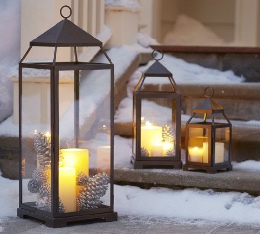 Glowing lanterns on front steps is a great way to welcome your guests.