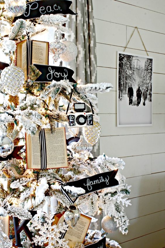 Gorgeous black and white flocked tree Via Golden Boys and Me