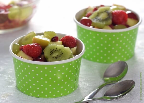 Green and red Christmas fruit salad recipe by Eats Amazing