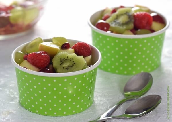 Green and red Christmas fruit salad recipe by Eats Amazing