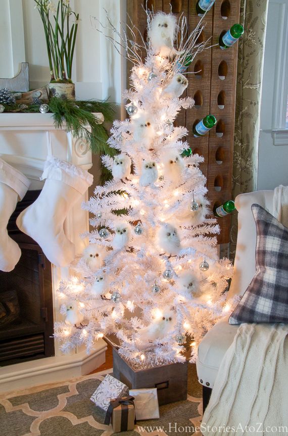Little white Christmas tree look absolutely charming.