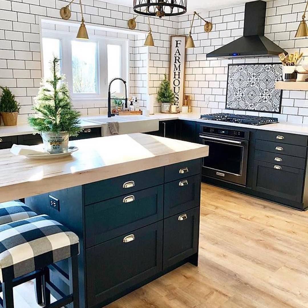 Love this Kitchen, and the sweet little tree on the island.