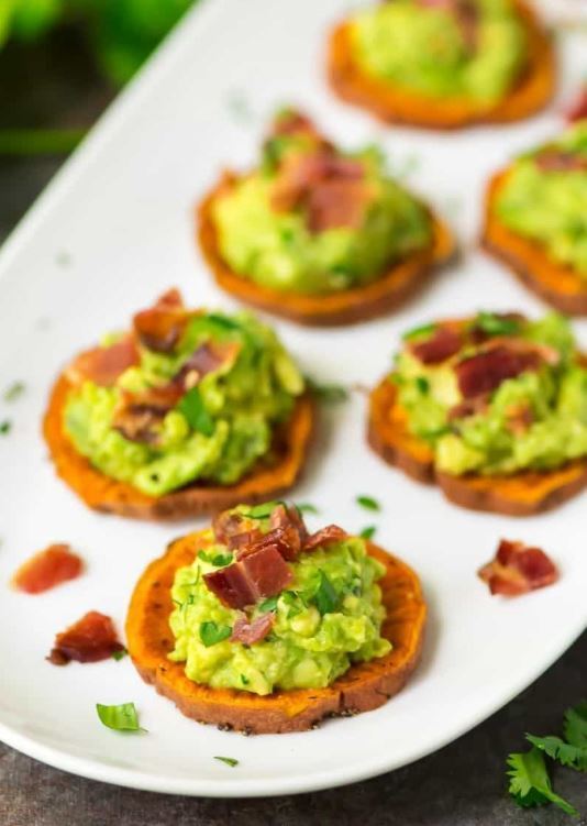 Sweet Potato Bites with Avocado and Bacon.